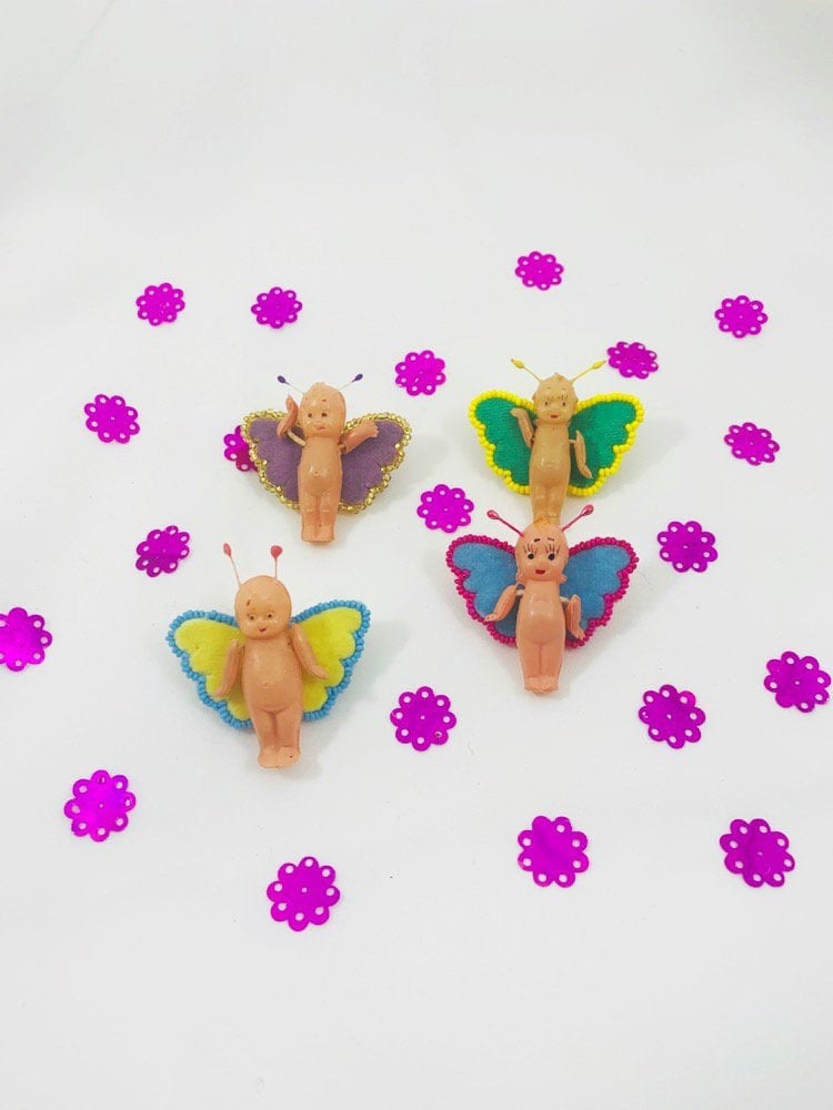 Schmetterling Kewpie Broschen Zelluloid Puppe Miniatur Perlen Flügel Bug Vintage Recycling Mixed Media Kunst Schmuck Samt Pin von lizardcamp
