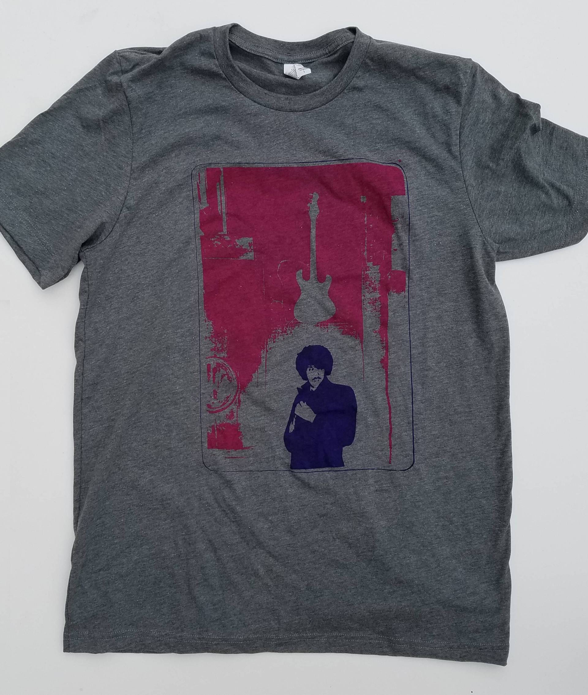 Dünnes Lizzy Phil Lynott T-Shirt Solo in Soho Dünnes Lizzy Phil Lynott T-Shirt Solo in Soho von lostwoodsprint