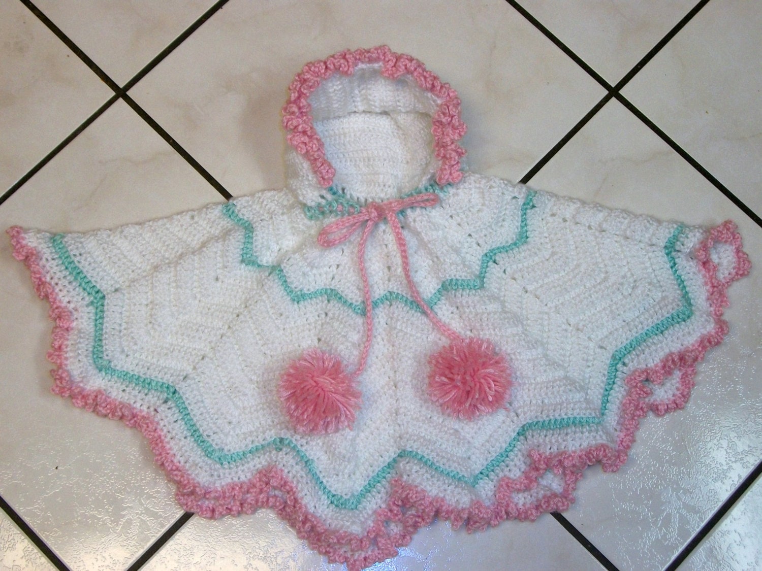 Crochet Baby Girls Hooded Poncho Sweater von madewithlovebysuzieq