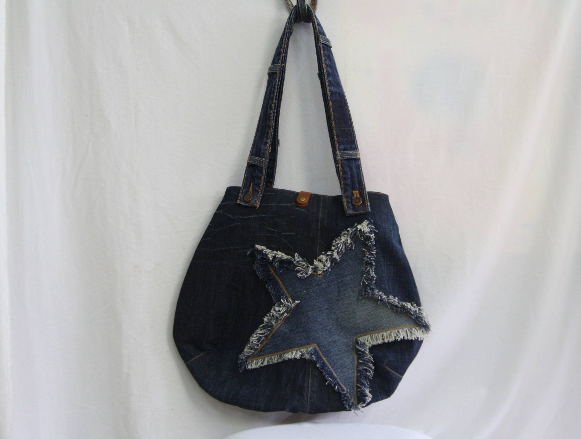 Abgerundete Tasche Mit Aufgetragenen Stern von mamlolobricole