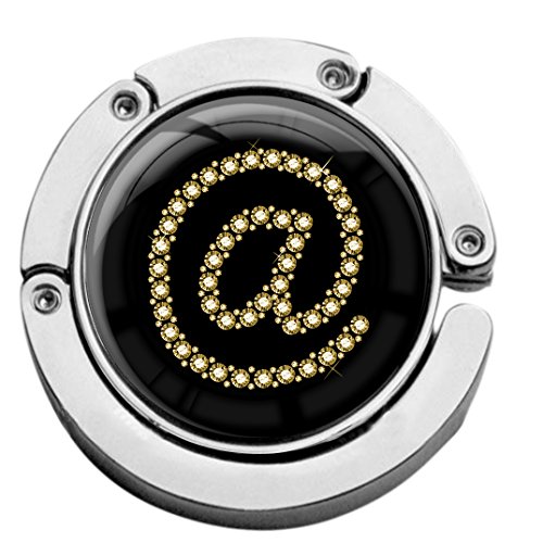 metALUm Taschenaufhänger Handtaschenhalter at Symbol IN Gold mit faltbarem Magnetverschluss #2601127 metALUm Taschenaufhänger Handtaschenhalter at Symbol IN Gold mit faltbarem Magnetverschluss #2601127 von metALUm