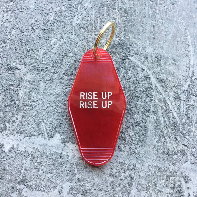 Seconds Sale Rise Up Schlüsselanhänger in Translucent Red Revolution Seconds Sale Rise Up Schlüsselanhänger in Translucent Red Revolution von minorthread