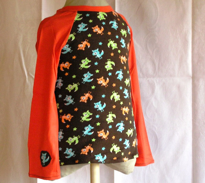 Langarmshirt Kinder Wölfe in Braun/Orange Gr. 110 von naehmaschinerie
