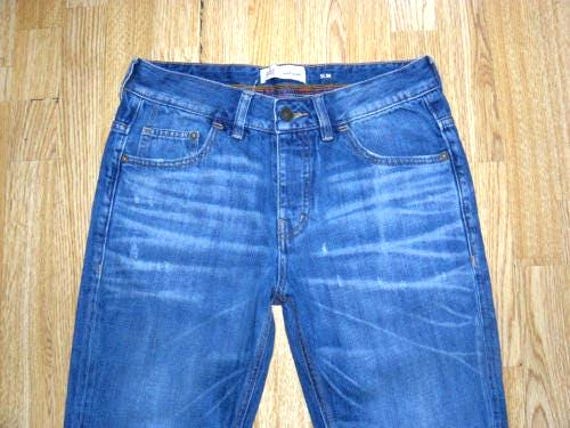Vintage Herren Blue Denim River Island Button Distressed Stonewashed Slim Jeans Größe W 30 L 33 von neringasvintageshop