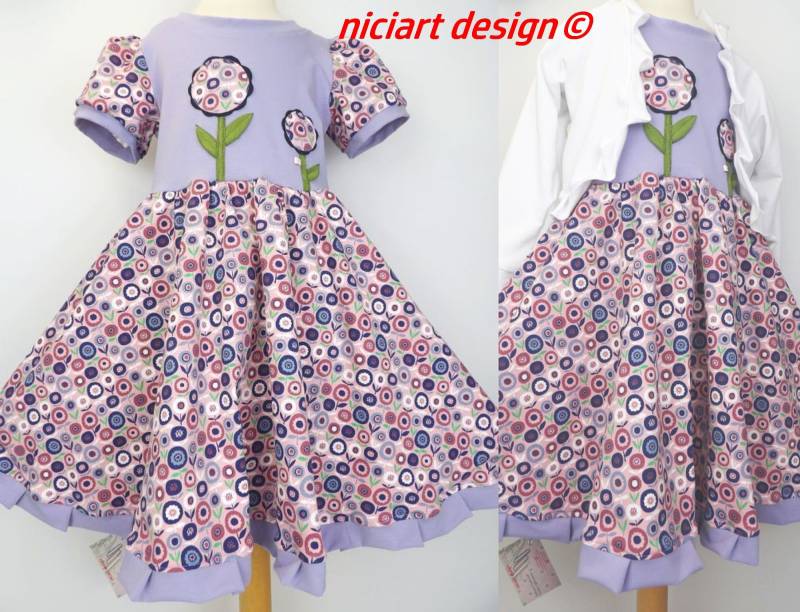 Drehkleid Tellerrock Kleid Mädchenkleid Bw Jersey Flieder Bunt Blumen Wahlweise Mit Stirnband O. Bolerojacke Niciart Design von niciartdesign