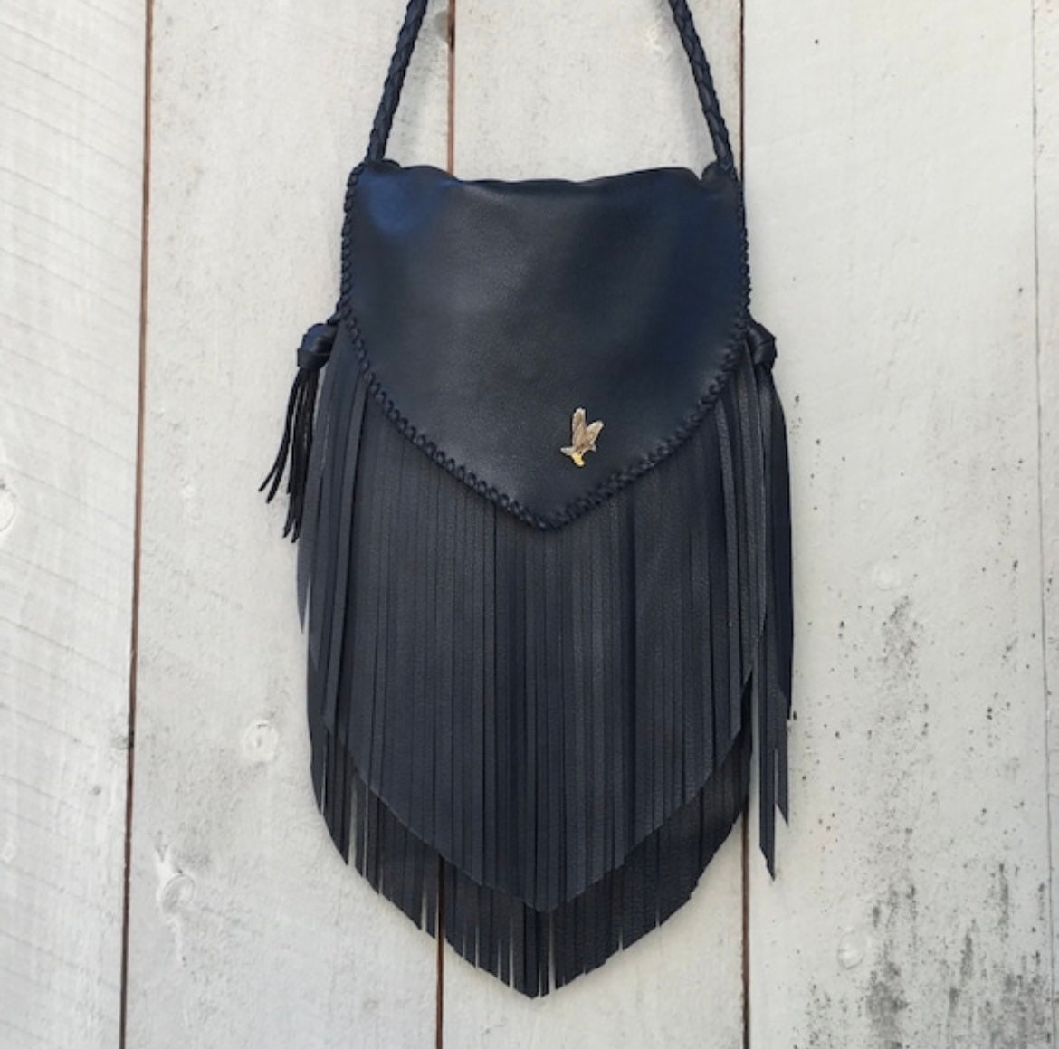 Die Woodstock Fransentasche von ofthesunleather