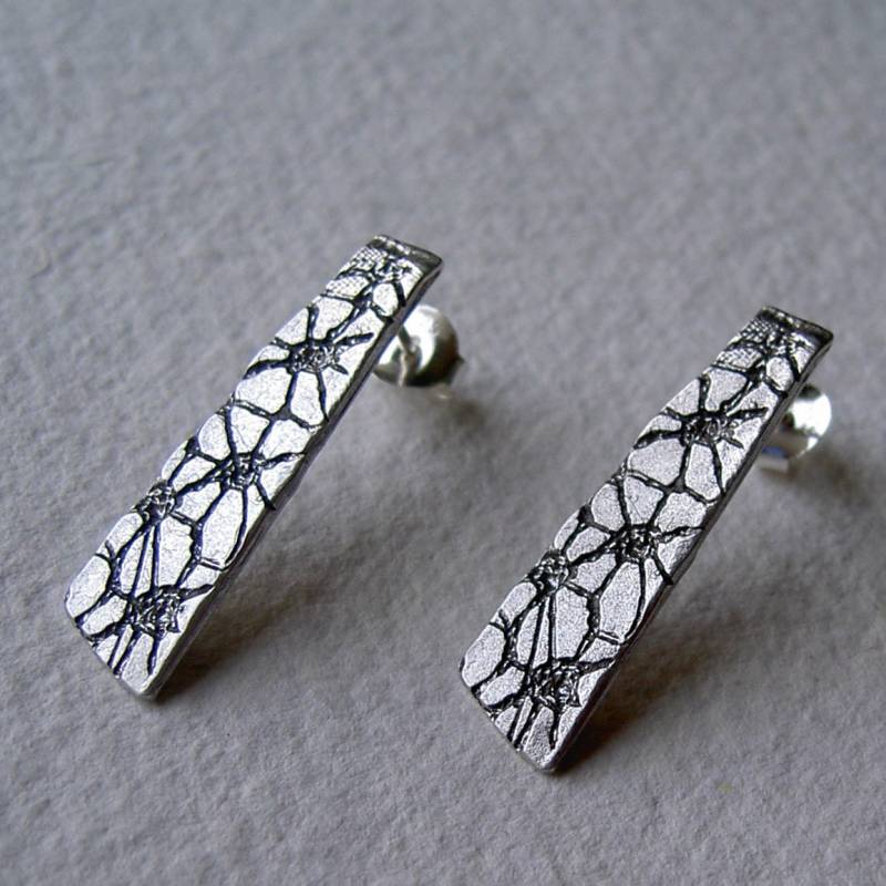 Ausstehende Trapeze Picot von platines