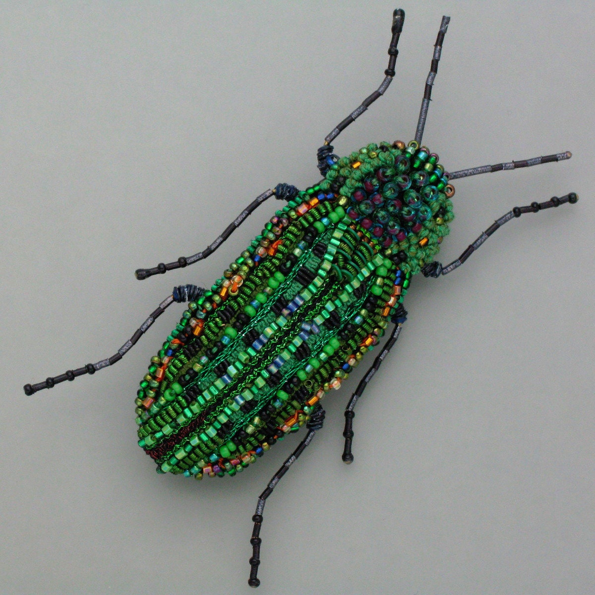 Bunte Brosche Gregor Samsa von schmuckwerkshop