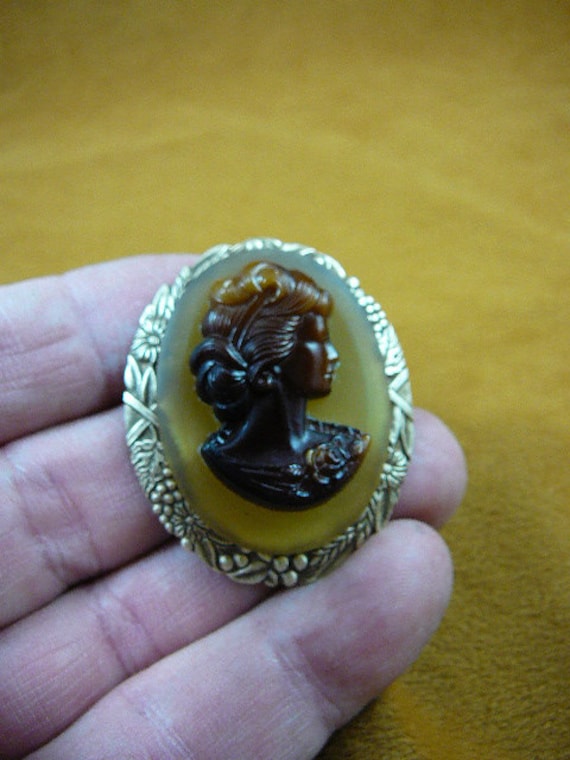 Vintage Gesicht Frau Mit Welligem Haar Oval Dunkelbraun Und Dunkelgelb Glas Cameo Pin Brosche C1505 Vintage Gesicht Frau Mit Welligem Haar Oval Dunkelbraun Und Dunkelgelb Glas Cameo Pin Brosche C1505 von sharkman123