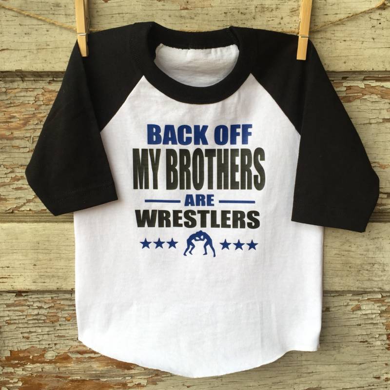 Wrestling Schwester Raglan von shopkrissydonohue