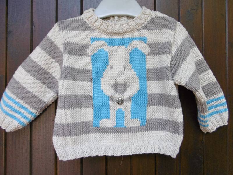 Handgestricktes Babypullover-Hundemuster Handgestricktes Babypullover-Hundemuster von souricettecreation