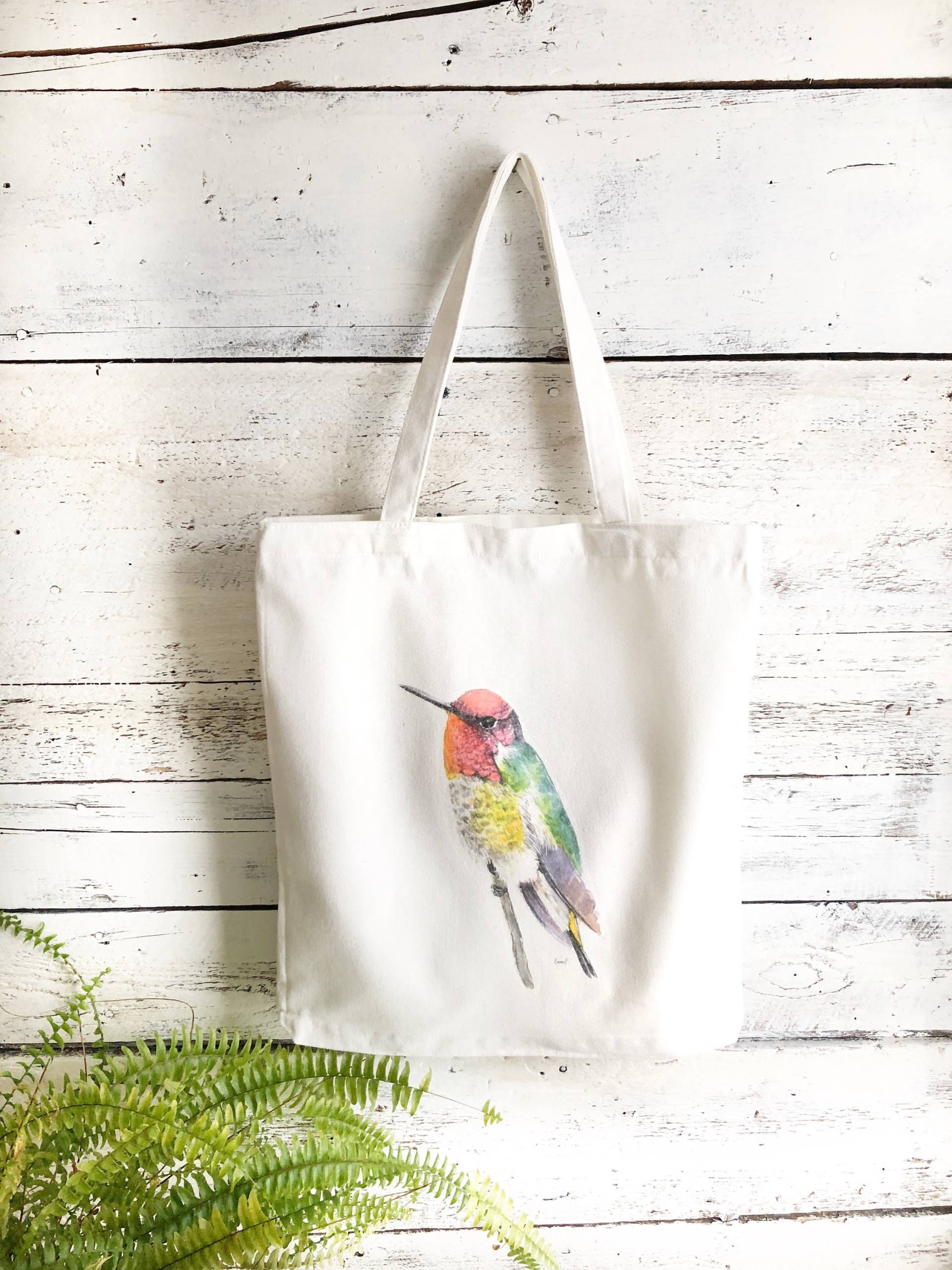 Wiederverwendbare Stofftasche Mit Kunst Von Emma Pyle, Knallbunter Kolibri von studioontenth