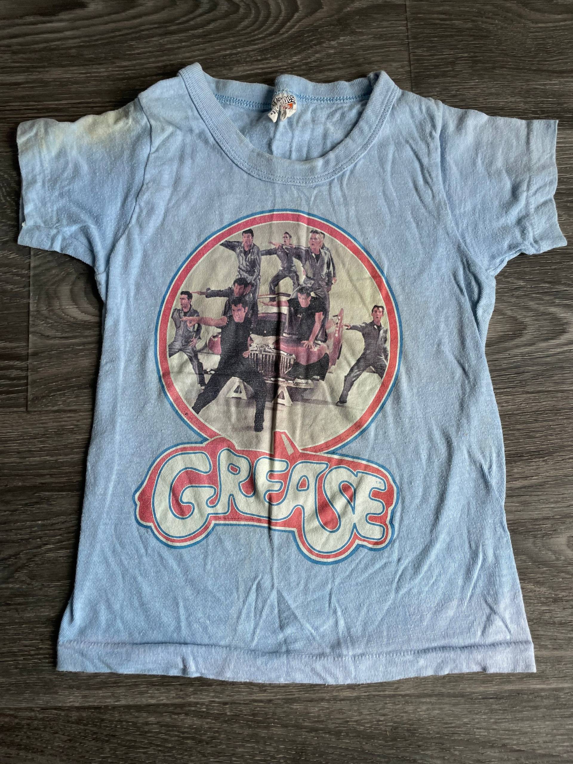 Grease Shirt 1978 Vintage Film T-Shirt John Travolta Olivia Newton Danny Sandy Hanes Usa Kinder Jugend 6-8 Grease Shirt 1978 Vintage Film T-Shirt John Travolta Olivia Newton Danny Sandy Hanes Usa Kinder Jugend 6-8 von sweetVTGtshirt