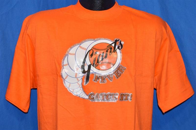 70Er Jahre San Francisco Giants Fever Glitzer Bügelbild Baseball Orange Vintage T-Shirt Large 70Er Jahre San Francisco Giants Fever Glitzer Bügelbild Baseball Orange Vintage T-Shirt Large von thecaptainsvintage