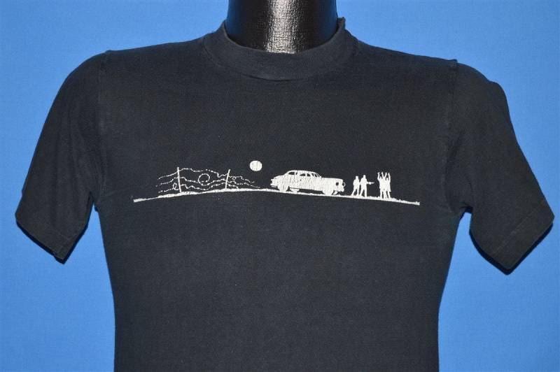 70S Das Zwiebelfeld Filmplakat T-Shirt Small 70S Das Zwiebelfeld Filmplakat T-Shirt Small von thecaptainsvintage