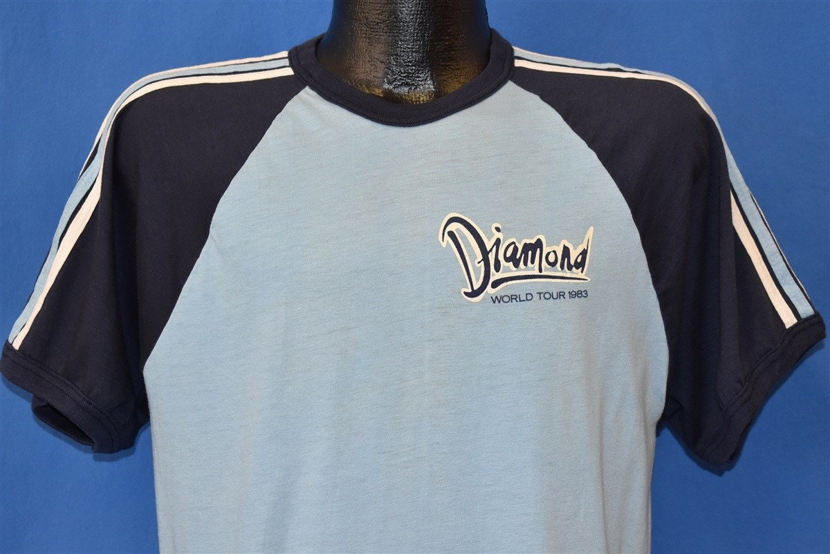 80Er Jahre Neil Diamond World Tour 1983 Jersey T-Shirt Large 80Er Jahre Neil Diamond World Tour 1983 Jersey T-Shirt Large von thecaptainsvintage