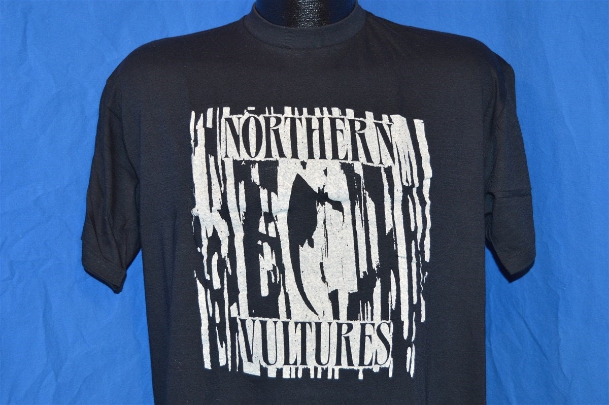 80Er Jahre Nordgeier Montreal Eingeborenes Punk Band Schwarz Vintage T-Shirt Large 80Er Jahre Nordgeier Montreal Eingeborenes Punk Band Schwarz Vintage T-Shirt Large von thecaptainsvintage