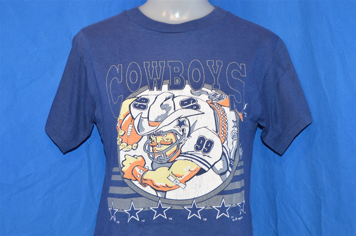 90S Dallas Cowboys #99 Jack Daisy Cartoon Blau Vintage T-Shirt Jugendstil Medium 10-12 90S Dallas Cowboys #99 Jack Daisy Cartoon Blau Vintage T-Shirt Jugendstil Medium 10-12 von thecaptainsvintage