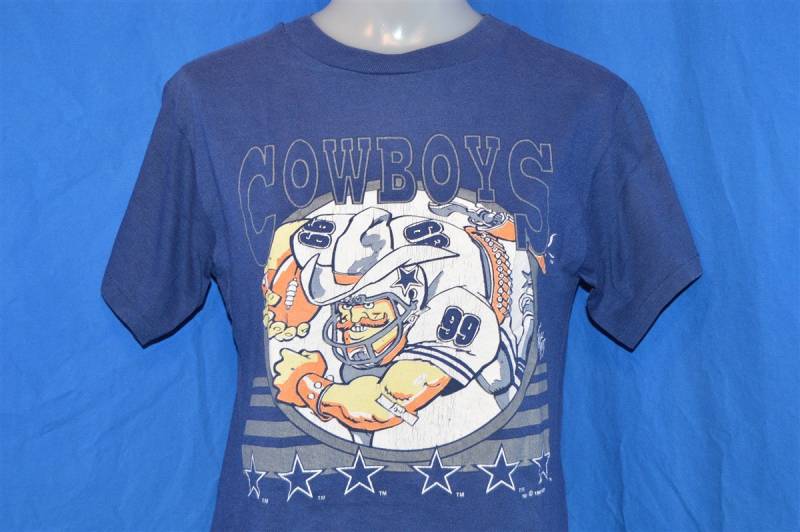 90S Dallas Cowboys #99 Jack Daisy Cartoon Blau Vintage T-Shirt Jugendstil Medium 10-12 90S Dallas Cowboys #99 Jack Daisy Cartoon Blau Vintage T-Shirt Jugendstil Medium 10-12 von thecaptainsvintage