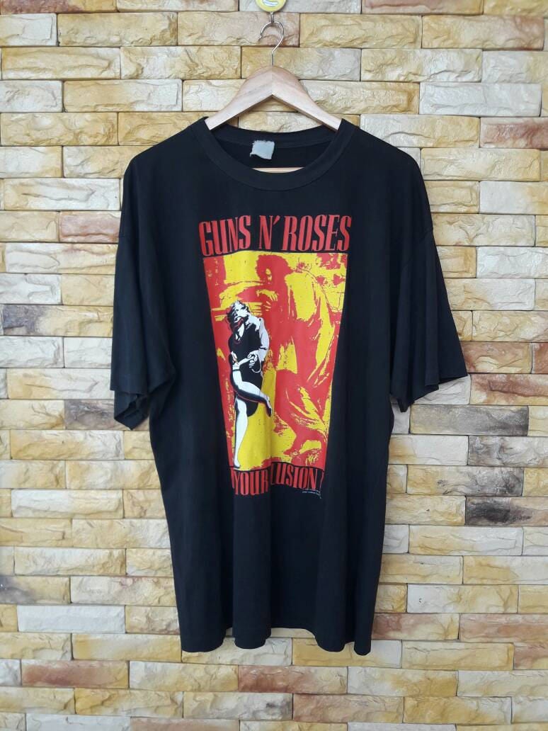 Guns N Roses Band T-Shirt in Xlarge Größe Nutzen Sie Ihre Illusion Tour 91Er 92Er Hard Rock Heavy Metal Wie Neuzustand Guns N Roses Band T-Shirt in Xlarge Größe Nutzen Sie Ihre Illusion Tour 91Er 92Er Hard Rock Heavy Metal Wie Neuzustand von thepurixvintage