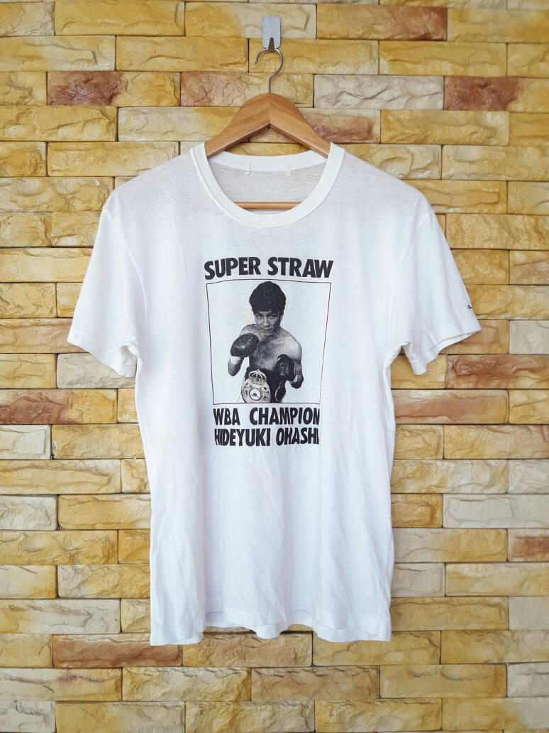 Selten Vintage 90Er Jahre Wba Strohgewicht Cup Hideyuki Ohashi Vs Porpaoinsponsors By Champion Tshirt Größe M Selten Vintage 90Er Jahre Wba Strohgewicht Cup Hideyuki Ohashi Vs Porpaoinsponsors By Champion Tshirt Größe M von thepurixvintage