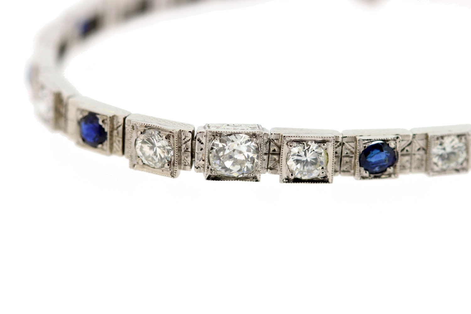 Armband Aus 14-Karätigem Gold Mit Diamanten Und Saphiren von timekeepersinclayton