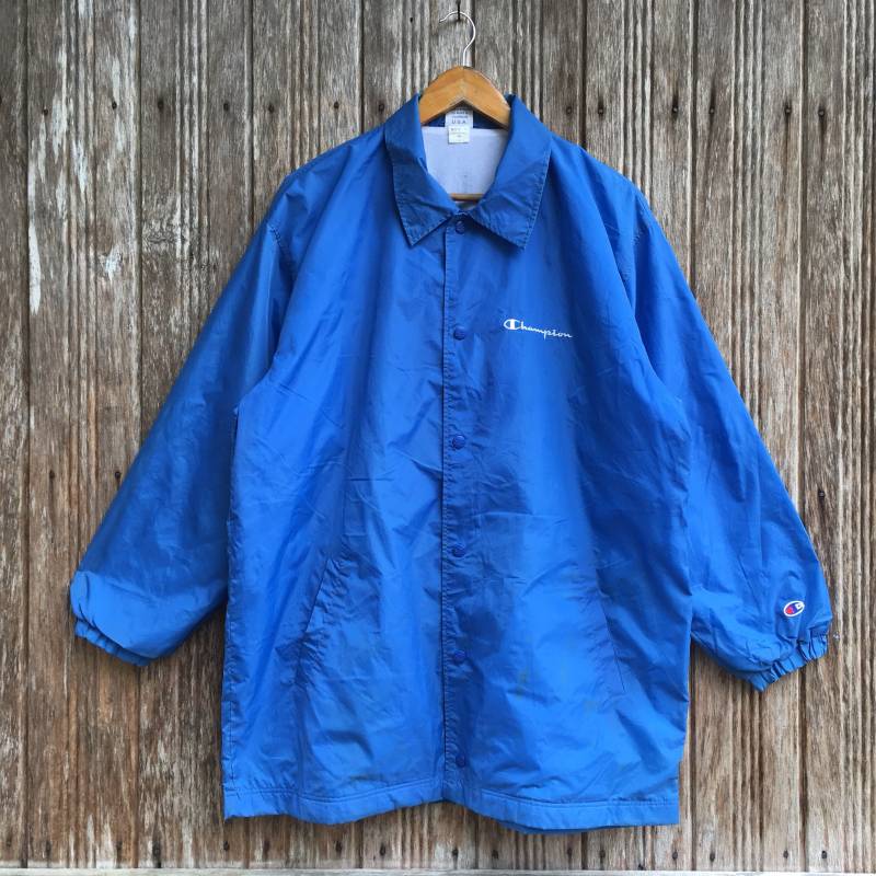 Vintage Champion Big Logo Zurück Druckknopf Windjacke Unisex Mittlere Größe von vintagegallaggers