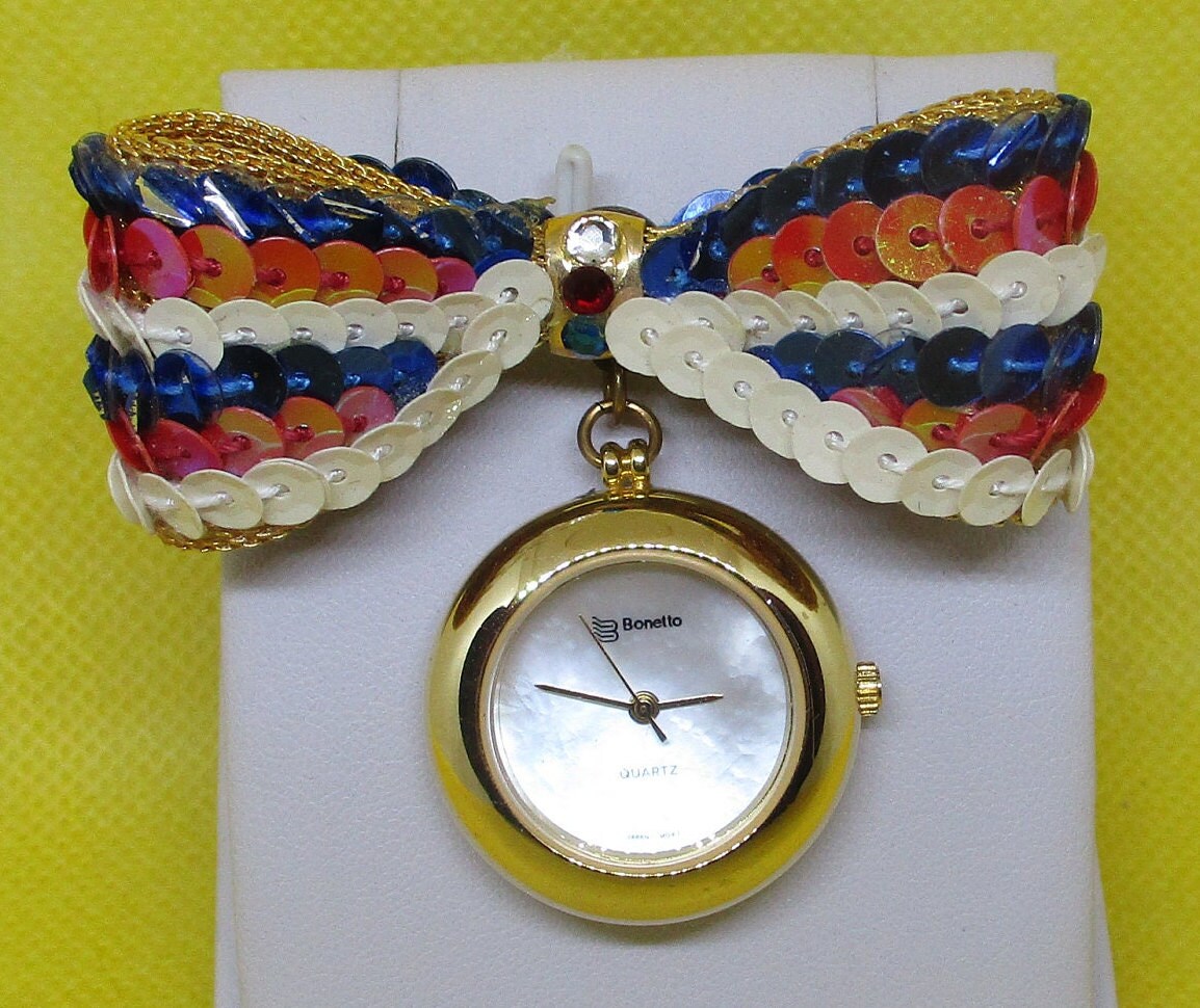 Bonetto Uhr Rot Weiß Blau Sequins Gold Mesh Bogen Perlmutt Armbanduhr Brosche Military Japan Mmnt Schmuck von vserendipityboutique