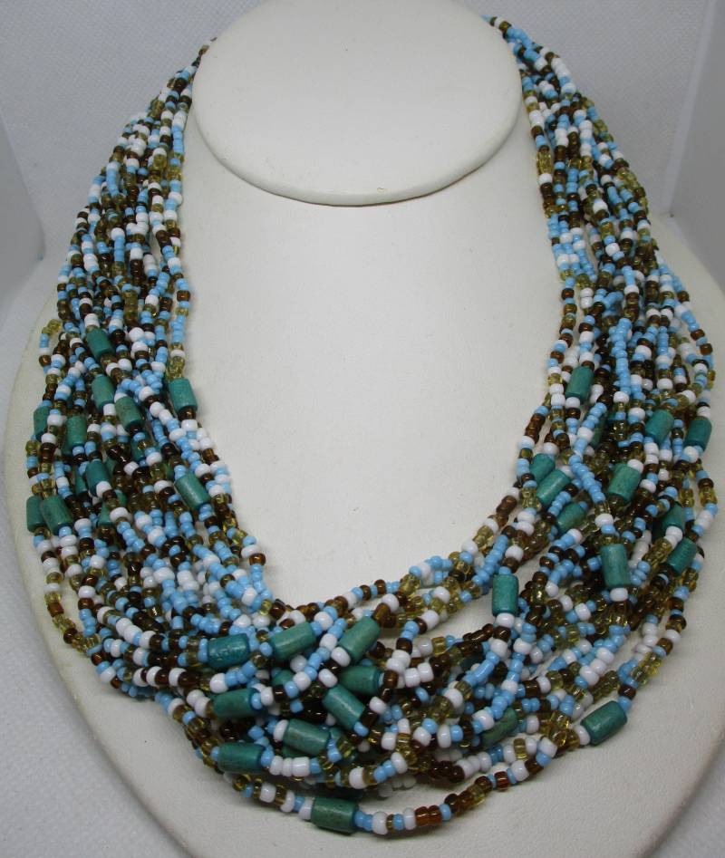 Vintage 20 Strang Glasperlen Halskette Türkis, Braun & Weiß von vserendipityboutique
