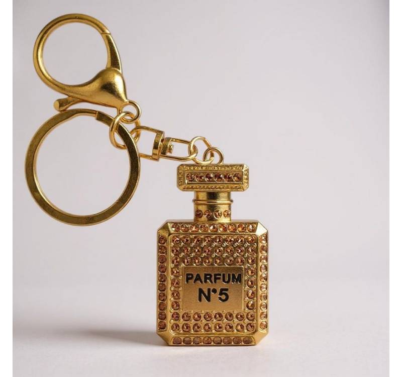 what the shop Schlüsselanhänger Taschenanhänger Parfum Look Gold mit Kristallen, ikonisches Parfum No 5 Flakon Design what the shop Schlüsselanhänger Taschenanhänger Parfum Look Gold mit Kristallen, ikonisches Parfum No 5 Flakon Design von what the shop