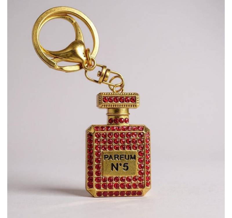 what the shop Schlüsselanhänger Taschenanhänger Parfum Look Gold mit Kristallen, ikonisches Parfum No 5 Flakon Design what the shop Schlüsselanhänger Taschenanhänger Parfum Look Gold mit Kristallen, ikonisches Parfum No 5 Flakon Design von what the shop