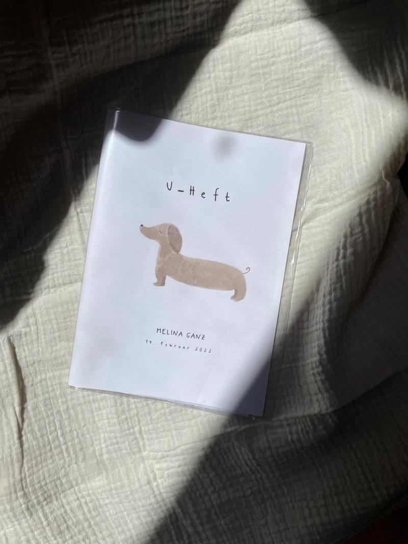 Personalisierte U-Heft-Hülle "Dackel' I Geschenk Für Kind, Baby, Schwangerschaft, Geburt Junge Oder Mädchen Personalisierte U-Heft-Hülle "Dackel' I Geschenk Für Kind, Baby, Schwangerschaft, Geburt Junge Oder Mädchen von wundertuete5