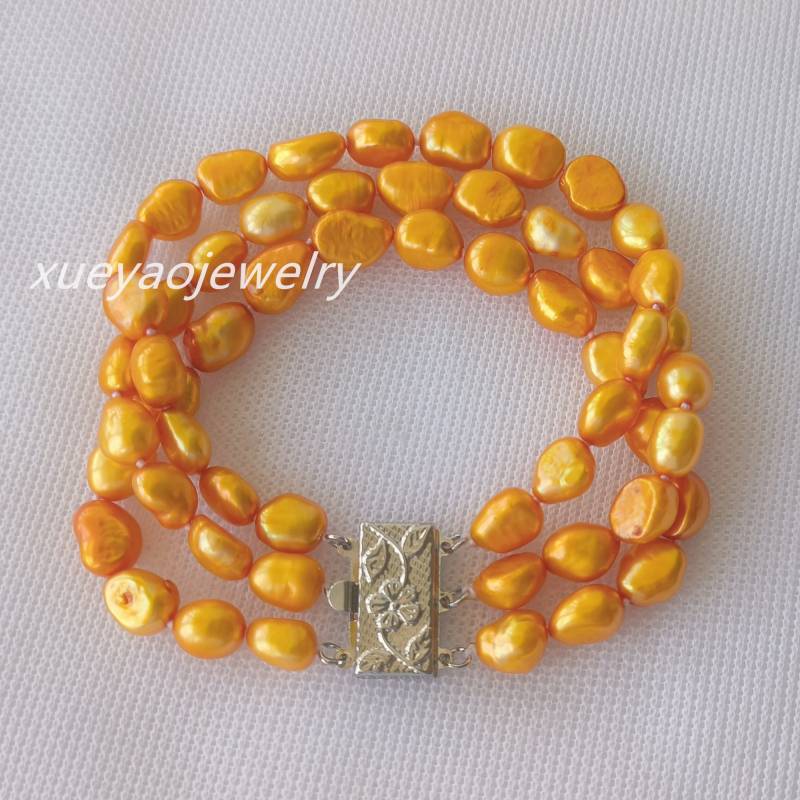 Oranges Barock Süsswasserperlen Armband - Mehrreihiges Design von xueyaojewelry