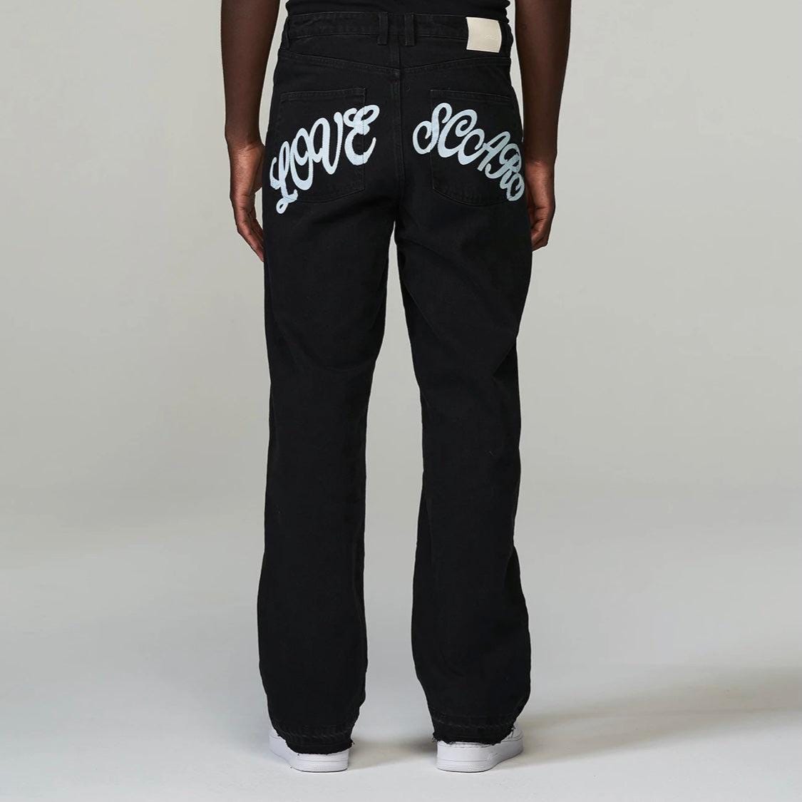 Love Scars Backprint Jeans Schwarz von zeitloszurich